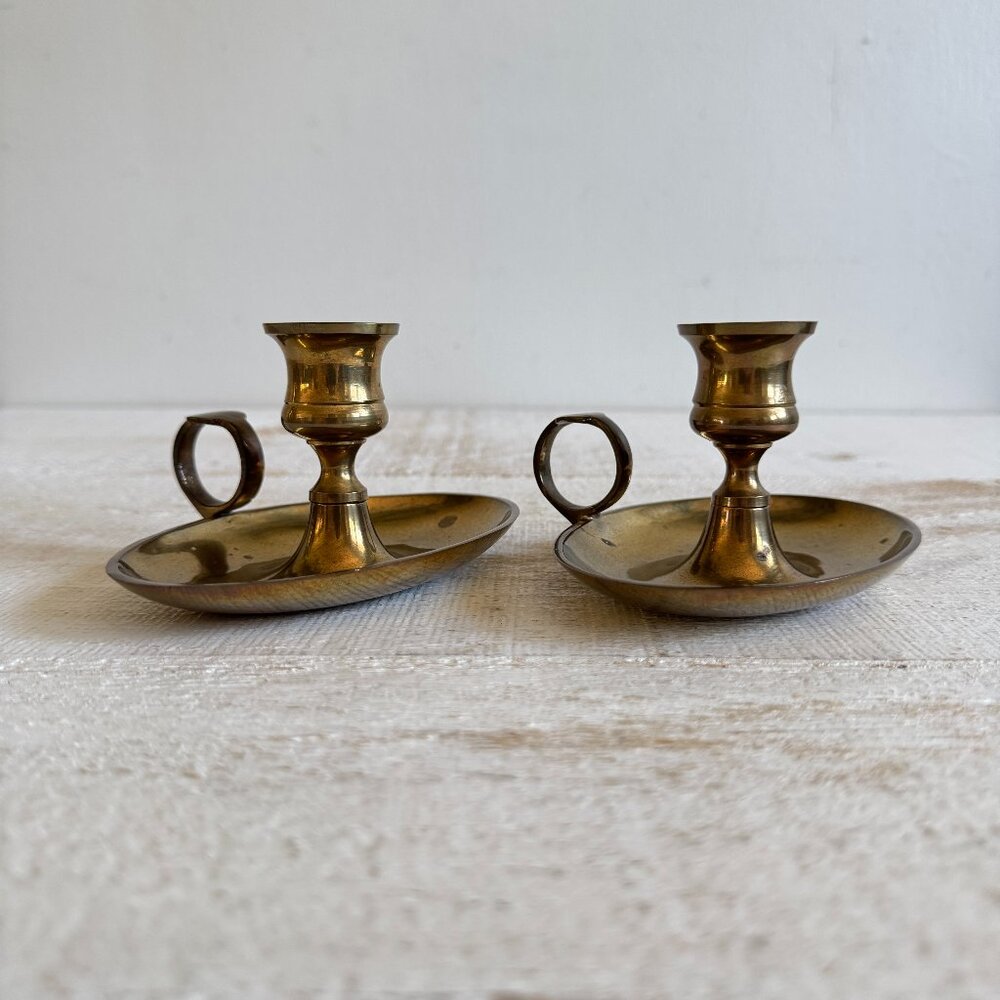 Vintage Set of Two Brass Candle Stick Holders with Finger Grips and Oval Bottoms